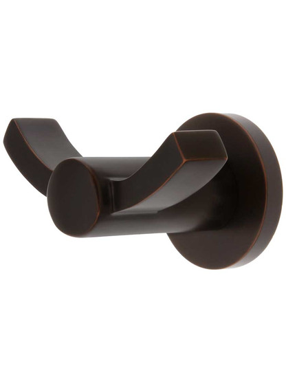 Modern Brass Double Hook with Small Disc Rosette in Oil Rubbed Bronze.